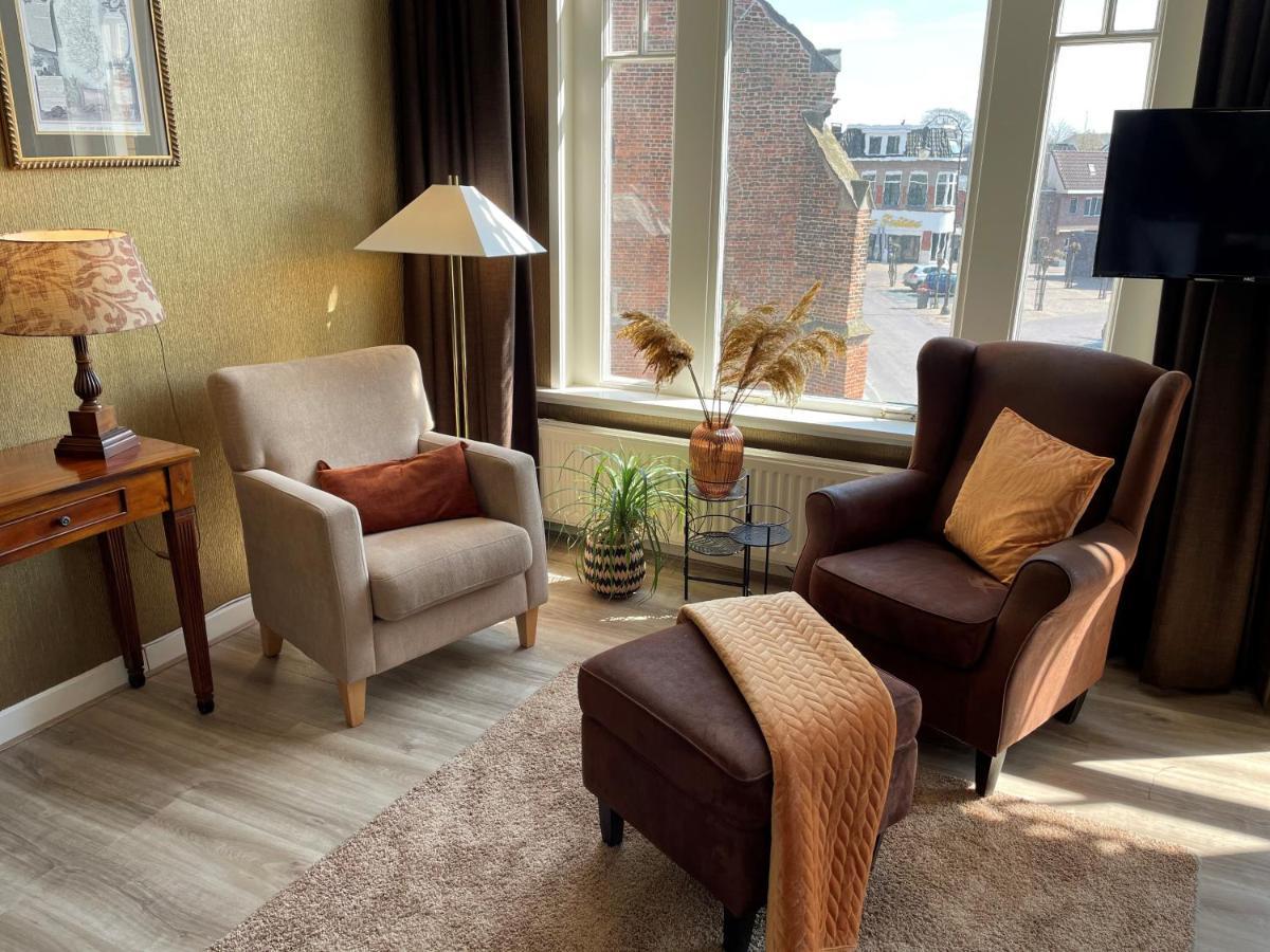 Hotel Restaurant Stad Munster Винтерсвейк Екстериор снимка A living room