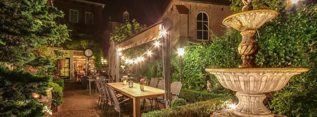 Hotel Restaurant Stad Munster Винтерсвейк Екстериор снимка The garden at night